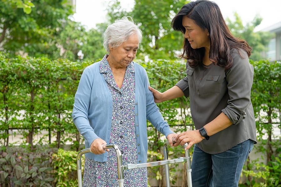 daughter discussing long-term care plans with elderly mother