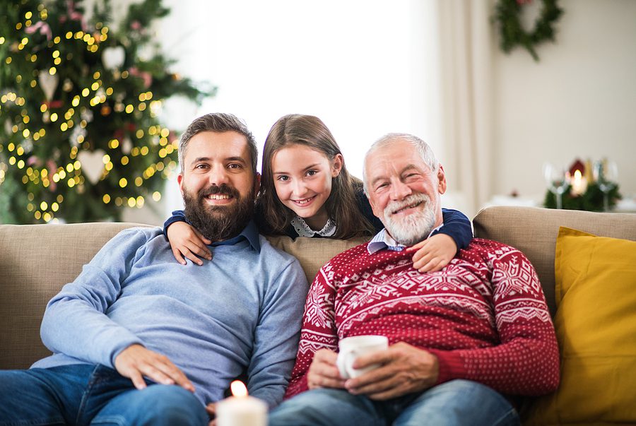 multi-generational family on Christmas - gift giving for older loved ones concept