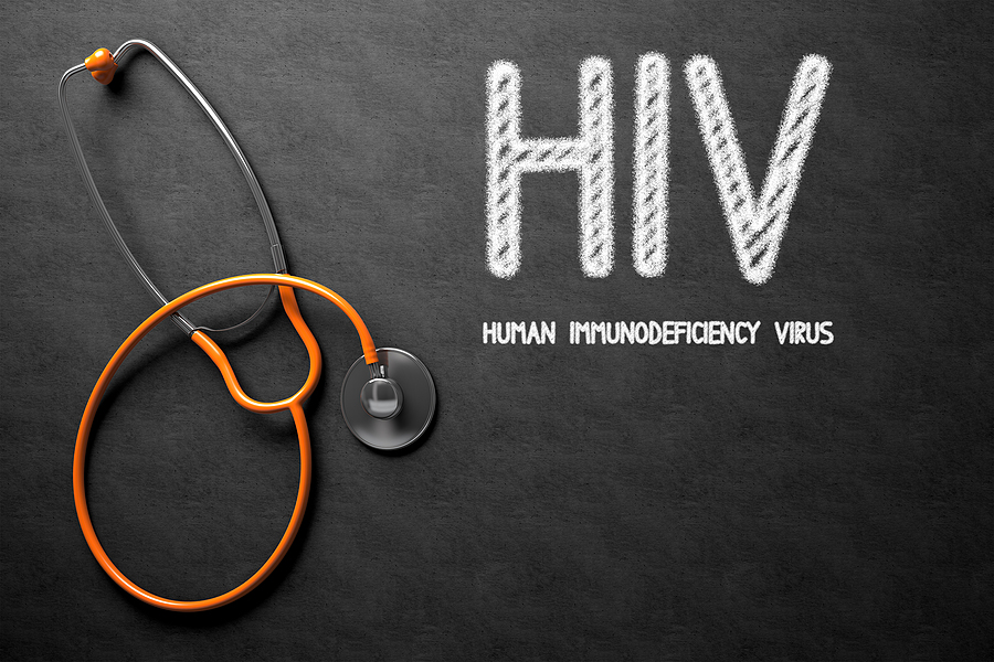 Medical Concept: HIV - Human Immunodeficiency Virus - Text on Black Chalkboard with a Stethoscope. HIV/AIDS Concept