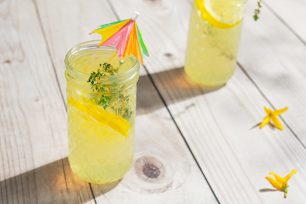 lemon drink with herbs for hydration in the summer concept